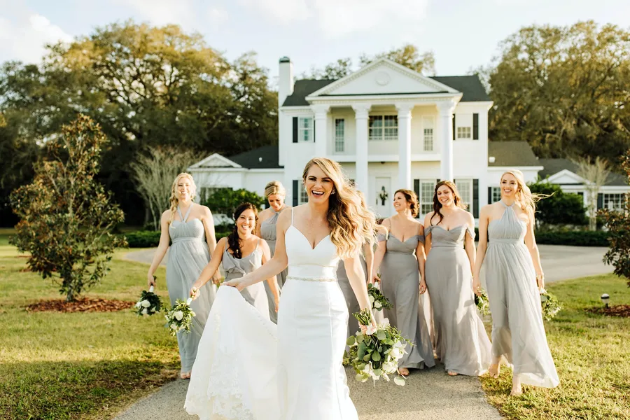 A bride and her bridesmaids on the drive
