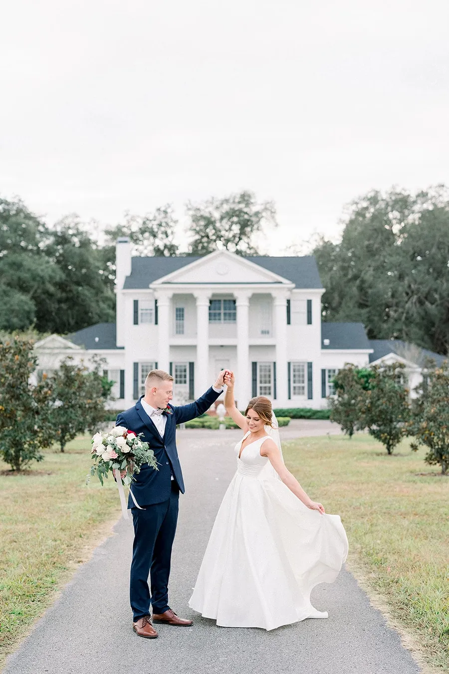 A couple dancing on the drive