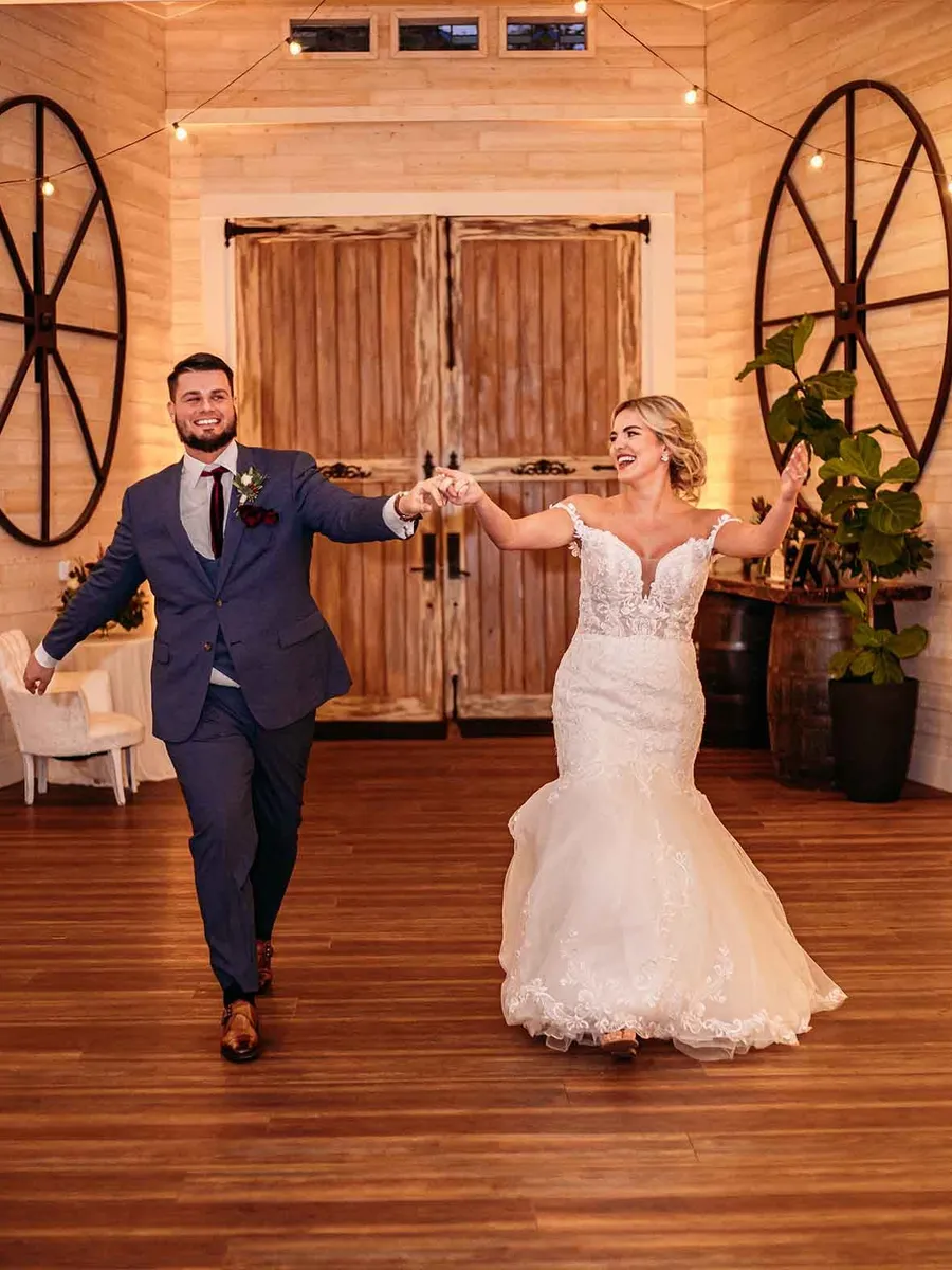 Savanah and Noah coming into the reception