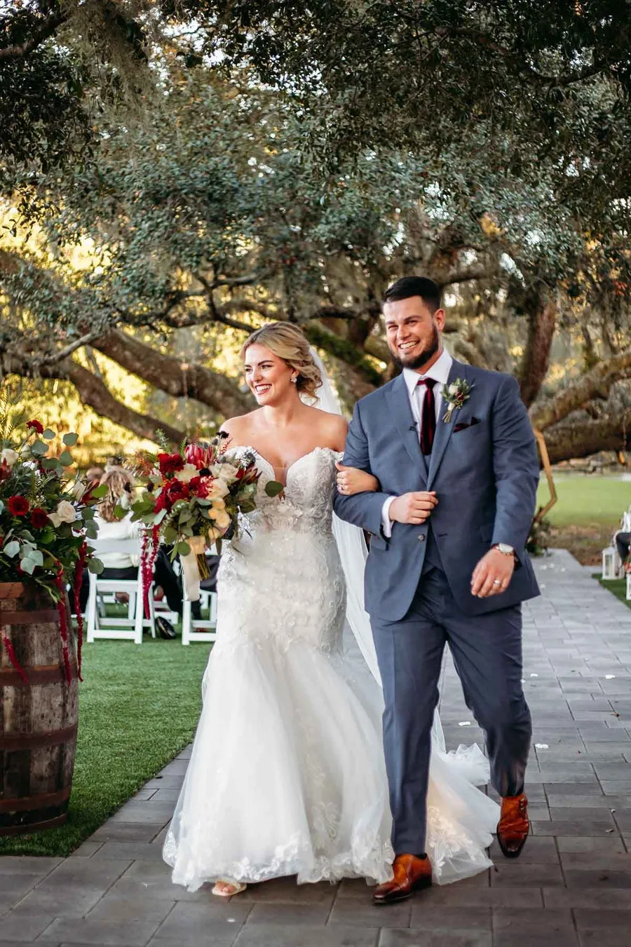 Savanah and Noah walking back up the aisle
