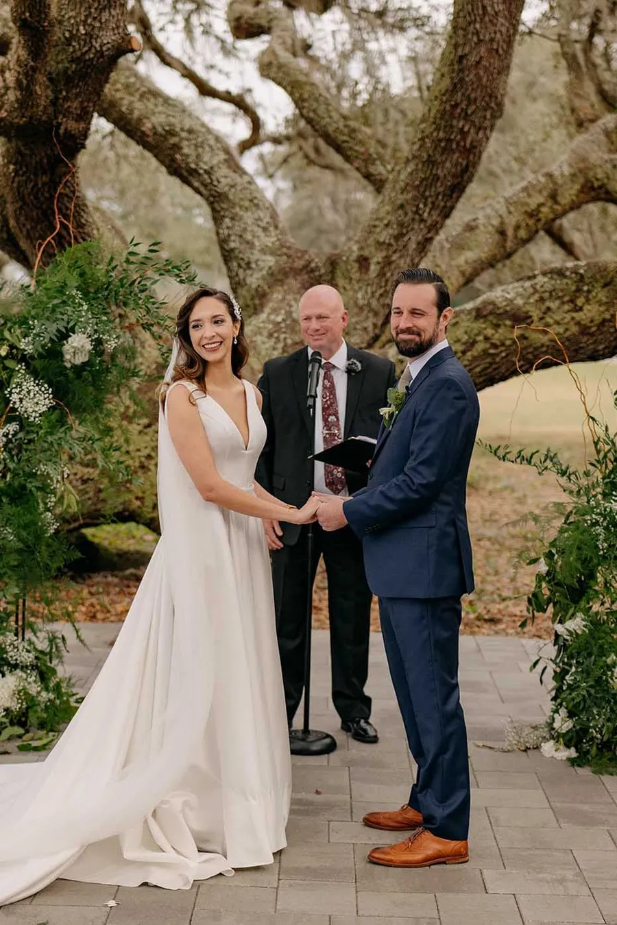 Matt and Marilia saying their vows